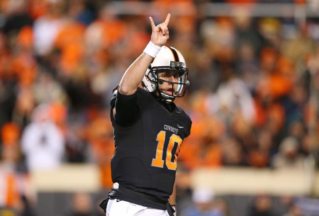 http://img.bleacherreport.net/img/images/photos/002/627/441/hi-res-451625049-clint-chelf-of-the-oklahoma-state-cowboys-reacts-in-the_crop_north.jpg?w=650&h=440&q=75