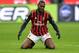MILAN, ITALY - NOVEMBER 23: Mario Balotelli of AC Milan looks dejected during the Serie A match between AC Milan and Genoa CFC at Stadio Giuseppe Meazza on November 23, 2013 in Milan, Italy. (Photo by Claudio Villa/Getty Images)