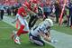 KANSAS CITY, MO - NOVEMBER 24: Running back Danny Woodhead #39 of the San Diego Chargers scores a touchdown against safety Quintin Demps #35 of the Kansas City Chiefs during the first half on November 24, 2013 at Arrowhead Stadium in Kansas City, Missouri. (Photo by Peter Aiken/Getty Images)