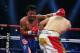 MACAU - NOVEMBER 24: Manny Pacquiao (L) of the Philippines punches Brandon Rios of the U.S. during their 'Clash in Cotai' WBO International Welterweight title fight on November 24, 2013 in Macau. (Photo by Nicky Loh/Getty Images)
