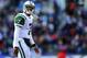 BALTIMORE, MD - NOVEMBER 24: Quarterback Geno Smith #7 of the New York Jets walks off the field after the Jets failed to convert on third down against the Baltimore Ravens in the first quarter at M&T Bank Stadium on November 24, 2013 in Baltimore, Maryland. (Photo by Rob Carr/Getty Images)
