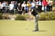 MELBOURNE, AUSTRALIA - NOVEMBER 21: Adam Scott of Australia plays a putt shot during day one of the World Cup of Golf at Royal Melbourne Golf Course on November 21, 2013 in Melbourne, Australia. (Photo by Robert Cianflone/Getty Images)