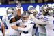 Nov 24, 2013; East Rutherford, NJ, USA; Dallas Cowboys kicker Dan Bailey (5) is congratulated by teammates after kicking the game-winning field goal in the fourth quarter against the New York Giants at MetLife Stadium. Mandatory Credit: Robert Deutsch-USA TODAY Sports