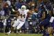Oct 26, 2013; Fort Worth, TX, USA; Texas Longhorns defensive end Jackson Jeffcoat (44) rushes the passer against TCU Horned Frogs offensive tackle Halapoulivaati Vaitai (74) in the third quarter of the game at Amon G. Carter Stadium. Mandatory Credit: Tim Heitman-USA TODAY Sports
