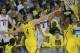 Apr 8, 2013; Atlanta, GA, USA; Louisville Cardinals guard Peyton Siva (3) lays the ball up as his hot is blocked by Michigan Wolverines forward Mitch McGary (4) and Glenn Robinson III (1) during the first half of the championship game in the 2013 NCAA mens Final Four at the Georgia Dome. Mandatory Credit: Richard Mackson-USA TODAY Sports