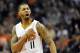 Nov 8, 2013; Phoenix, AZ, USA; Phoenix Suns power forward Markieff Morris (11) celebrates during the third quarter against the Denver Nuggets at US Airways Center. The Suns defeated the Nuggets 114-103. Mandatory Credit: Casey Sapio-USA TODAY Sports