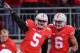 COLUMBUS, OH - NOVEMBER 23: Quarterback Braxton Miller #5 of the Ohio State Buckeyes celebrates his 37-yard touchdown run in the first quarter against the Indiana Hoosiers with Evan Spencer #6 of the Ohio State Buckeyes at Ohio Stadium on November 23, 2013 in Columbus, Ohio. (Photo by Jamie Sabau/Getty Images)