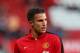 MANCHESTER, ENGLAND - NOVEMBER 10: Robin van Persie of Manchester United warms up prior to the Barclays Premier League match between Manchester United and Arsenal at Old Trafford on November 10, 2013 in Manchester, England. (Photo by Alex Livesey/Getty Images)