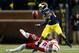 ANN ARBOR, MI - NOVEMBER 09: Jeremy Gallon #21 of the Michigan Wolverines can't hold on to this second-half pass with Stanley Jean-Baptiste #16 of the Nebraska Cornhuskers defending at Michigan Stadium on November 9, 2013 in Ann Arbor, Michigan. (Photo by Gregory Shamus/Getty Images)