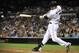 SAN DIEGO, CA - SEPTEMBER 23: Chase Headley #7 of the San Diego Padres hits an RBI single during the first inning of a baseball game against the Arizona Diamondbacks at Petco Park on September 23, 2013 in San Diego, California. (Photo by Denis Poroy/Getty Images)