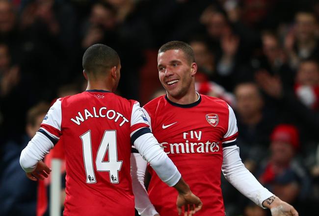 Hi-res-158798743-lukas-podolski-of-arsenal-celebrates-scoring-their_crop_north