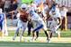 Nov 2, 2013; Austin, TX, USA; Texas Longhorns quarterback Tyrone Swoopes (18) runs the ball against the Kansas Jayhawks during the fourth quarter at Darrell K Royal-Texas Memorial Stadium. Texas beat Kansas 35-13. Mandatory Credit: Brendan Maloney-USA TODAY Sports