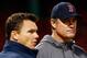 BOSTON, MA - OCTOBER 29: Manager John Farrell #53 of the Boston Red Sox and Executive Vice President and General Manager of the Boston Red Sox, Ben Cherington, watch as the team warms up during the team workout Fenway Park on October 29, 2013 in Boston, Massachusetts. (Photo by Jared Wickerham/Getty Images)