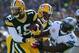 GREEN BAY, WI - OCTOBER 06: Myles White #19 of the Green Bay Packers is tackled by Stephen Tulloch #55 of the Detroit Lions at Lambeau Field on October 6, 2013 in Green Bay, Wisconsin. (Photo by Harry How/Getty Images)