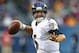 CHICAGO, IL - NOVEMBER 17: Joe Flacco #5 of the Baltimore Ravens looks for a receiver against the Chicago Bears at Soldier Field on November 17, 2013 in Chicago, Illinois. The Bears defeated the Ravens 23-20 in overtime. (Photo by Jonathan Daniel/Getty Images)