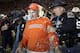 AUBURN, AL - NOVEMBER 19: Head Coach Tommy Tuberville of Auburn University tries to avoid a bucket of water while celebrating their win over the University of Alabama on November 19, 2005 at Jordan-Hare Stadium in Auburn, Alabama. Auburn defeated Alabama 28-18. (Photo by Chris Graythen/Getty Images)