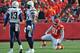 KANSAS CITY, MO - NOVEMBER 24: Defensive end Tamba Hali #91 of the Kansas City Chiefs kneels on the ground, after hurting his right leg against the San Diego Chargers during the first half on November 24, 2013 at Arrowhead Stadium in Kansas City, Missouri. (Photo by Peter Aiken/Getty Images)