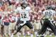 TALLAHASSEE, FL - NOVEMBER 23: Taylor Davis #12 of the Idaho Vandals looks to make a pass against the Florida State Seminoles during the first half at Doak Campbell Stadium on November 23, 2013 in Tallahassee, Florida. (Photo by Jeff Gammons/Getty Images)