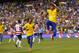 May 30, 2012; Landover, MD, USA; Brazil forward Neymar (11) celebrates after scoring a goal on a penalty kick against the USA in the first half at FedEx Field. Mandatory Credit: Geoff Burke-USA TODAY Sports
