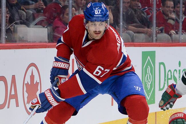 Hi-res-450657275-max-pacioretty-of-the-montreal-canadiens-controls-the_crop_north