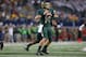 ARLINGTON, TX - NOVEMBER 16: Bryce Petty #14 of the Baylor Bears throws against the Texas Tech Red Raiders at AT&T Stadium on November 16, 2013 in Arlington, Texas. (Photo by Ronald Martinez/Getty Images)