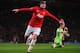 MANCHESTER, ENGLAND - SEPTEMBER 17: Wayne Rooney of Manchester United celebrates scoring his team's third goal during the UEFA Champions League Group A match between Manchester United and Bayer Leverkusen at Old Trafford on September 17, 2013 in Manchester, England. (Photo by Michael Regan/Getty Images)