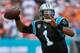 MIAMI GARDENS, FL - NOVEMBER 24: Cam Newton #1 of the Carolina Panthers attempts to pass the ball in the second quarter against the Miami Dolphins at Sun Life Stadium on November 24, 2013 in Miami Gardens, Florida. (Photo by Chris Trotman/Getty Images)