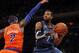 Nov 3, 2013; New York, NY, USA; Minnesota Timberwolves power forward Derrick Williams (7) drives to the basket against New York Knicks small forward Carmelo Anthony (7) in the first quarter at Madison Square Garden. Mandatory Credit: Noah K. Murray-USA TODAY Sports