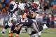 Nov 24, 2013; Foxborough, MA, USA; Denver Broncos running back Montee Ball (28) fumbles the ball after a hit from New England Patriots defensive end Rob Ninkovich (50) and linebacker Dane Fletcher (52) during the third quarter at Gillette Stadium. Mandatory Credit: Stew Milne-USA TODAY Sports