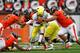 CORVALLIS, OR - NOVEMBER 24: Kenjon Barner #24 of the Oregon Ducks runs against the defense of the Oregon State Beavers during the 116th Civil War on November 24, 2012 at the Reser Stadium in Corvallis, Oregon. (Photo by Jonathan Ferrey/Getty Images)