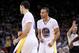 Nov 16, 2013; Oakland, CA, USA; Golden State Warriors guard Stephen Curry (30) reacts after guard Klay Thompson (11) made a three point shot against the Utah Jazz in the fourth quarter at Oracle Arena. The Warriors defeated the Jazz 102-88. Mandatory Credit: Cary Edmondson-USA TODAY Sports