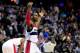 WASHINGTON, DC - NOVEMBER 26: John Wall #2 of the Washington Wizards celebrates during the closing seconds of their 116-111 win over the Los Angeles Lakers at Verizon Center on November 26, 2013 in Washington, DC. NOTE TO USER: User expressly acknowledges and agrees that, by downloading and or using this photograph, User is consenting to the terms and conditions of the Getty Images License Agreement. (Photo by Rob Carr/Getty Images)