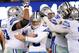 Nov 24, 2013; East Rutherford, NJ, USA; Dallas Cowboys kicker Dan Bailey (5) is congratulated by teammates after kicking the game-winning field goal in the fourth quarter against the New York Giants at MetLife Stadium. Mandatory Credit: Robert Deutsch-USA TODAY Sports