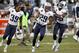 Nov 24, 2013; Oakland, CA, USA; Tennessee Titans strong safety Daimion Stafford (39), cornerback Blidi Wreh-Wilson (29) and cornerback Alterraun Verner (20) celebrate after the Titans defeated the Oakland Raiders 23-19 at O.co Coliseum. Mandatory Credit: Cary Edmondson-USA TODAY Sports