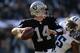 OAKLAND, CA - NOVEMBER 24: Matt McGloin #14 of the Oakland Raiders drops back to pass against the Tennessee Titans during the second quarter at O.co Coliseum on November 24, 2013 in Oakland, California. (Photo by Thearon W. Henderson/Getty Images)