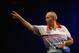 SYDNEY, AUSTRALIA - AUGUST 30: Phil Taylor of England in action during his quarter-final match against Paul Nicholson of England during day two of the Sydney Darts Masters at Luna Park on August 30, 2013 in Sydney, Australia. (Photo by Mark Kolbe/Getty Images)