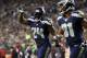 Sep 15, 2013; Seattle, WA, USA; Seattle Seahawks running back Marshawn Lynch (24) celebrates after rushing for a touchdown against the San Francisco 49ers during the third quarter at CenturyLink Field. Mandatory Credit: Joe Nicholson-USA TODAY Sports