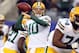 Nov 17, 2013; East Rutherford, NJ, USA; Green Bay Packers quarterback Matt Flynn (10) drops back to pass during warmups before the start of a game against the New York Giants at MetLife Stadium. Mandatory Credit: Brad Penner-USA TODAY Sports