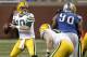 DETROIT, MI - DECEMBER 12: Matt Flynn #10 of the Green Bay Packers looks to throw a second quarter pass behind Ndamukong Suh #90 of the Detroit Lions on December 12, 2010 at Ford Field in Detroit, Michigan. (Photo by Gregory Shamus/Getty Images)