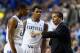 LEXINGTON, KY - NOVEMBER 25: John Calipari the head coach of the Kentucky Wildcats talks with Aaron Harrison #2 and Andrew Harrison #5 during the game against the Cleveland State Vikings at Rupp Arena on November 25, 2013 in Lexington, Kentucky. (Photo by Andy Lyons/Getty Images)