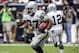 Nov 17, 2013; Houston, TX, USA; Oakland Raiders running back Rashad Jennings (27) runs the ball for a touchdown during the third quarter against the Houston Texans at Reliant Stadium. The Raiders defeated the Texans 28-23. Mandatory Credit: Troy Taormina-USA TODAY Sports