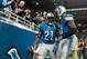 Nov 28, 2013; Detroit, MI, USA; Detroit Lions wide receiver Nate Burleson (13) celebrates after a touchdown by running back Reggie Bush (21) during the second quarter against the Green Bay Packers during a NFL football game on Thanksgiving at Ford Field. Mandatory Credit: Tim Fuller-USA TODAY Sports