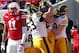 Nov 29, 2013; Lincoln, NE, USA; Iowa Hawkeyes running back Mark Weisman (45) is congratulated by his teammates after scoring a touchdown against Nebraska Cornhuskers in the second quarter at Memorial Stadium. Mandatory Credit: Bruce Thorson-USA TODAY Sports
