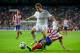 MADRID, SPAIN - SEPTEMBER 28: Fabio Coentrao of Real Madrid CF competes for the ball with Juan Francisco Torres alias Juanfran of Atletico de Madrid during the La Liga match between Real Madrid CF and Club Atletico de Madrid at Estadio Santiago Bernabeu on September 28, 2013 in Madrid, Spain. (Photo by Gonzalo Arroyo Moreno/Getty Images)