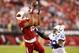 Nov 24, 2013; Phoenix, AZ, USA; Arizona Cardinals wide receiver Michael Floyd (left) catches a pass under pressure from Indianapolis Colts cornerback Vontae Davis in the first half at University of Phoenix Stadium. Mandatory Credit: Mark J. Rebilas-USA TODAY Sports