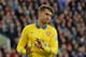 CARDIFF, WALES - NOVEMBER 30: Aaron Ramsey of Arsenal doesn't celebrate scoring their first goal in respect for Cardiff his old team during the Barclays Premier League match between Cardiff City and Arsenal at Cardiff City Stadium on November 30, 2013 in Cardiff, Wales. (Photo by Christopher Lee/Getty Images)