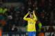 CARDIFF, WALES - NOVEMBER 30: Aaron Ramsey of Arsenal gestures towards both sets of fans after the match during the Barclays Premier League match between Cardiff City and Arsenal at Cardiff City Stadium on November 30, 2013 in Cardiff, Wales. (Photo by Christopher Lee/Getty Images)