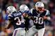 FOXBORO, MA - NOVEMBER 24: Running back Brandon Bolden #38, running back Shane Vereen #34, and running back Stevan Ridley #22 of the New England Patriots celebrate against the Denver Broncos during a game at Gillette Stadium on November 24, 2013 in Foxboro, Massachusetts. (Photo by Jim Rogash/Getty Images)