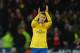 CARDIFF, WALES - NOVEMBER 30: Aaron Ramsey of Arsenal appaulds both sets of fans after the match during the Barclays Premier League match between Cardiff City and Arsenal at Cardiff City Stadium on November 30, 2013 in Cardiff, Wales. (Photo by Christopher Lee/Getty Images)