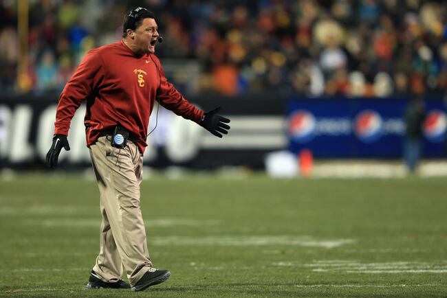 Hi-res-451644213-head-coach-ed-orgeron-of-the-usc-trojans-leads-his-team_crop_north